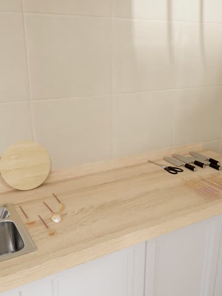 A Spacious Kitchen Storage Shelf Featuring a Drainage Basket